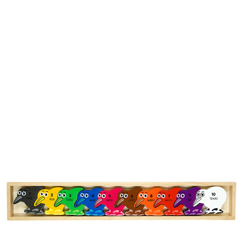 Set of colorful bird-shaped figurines in a wooden display case on a white background